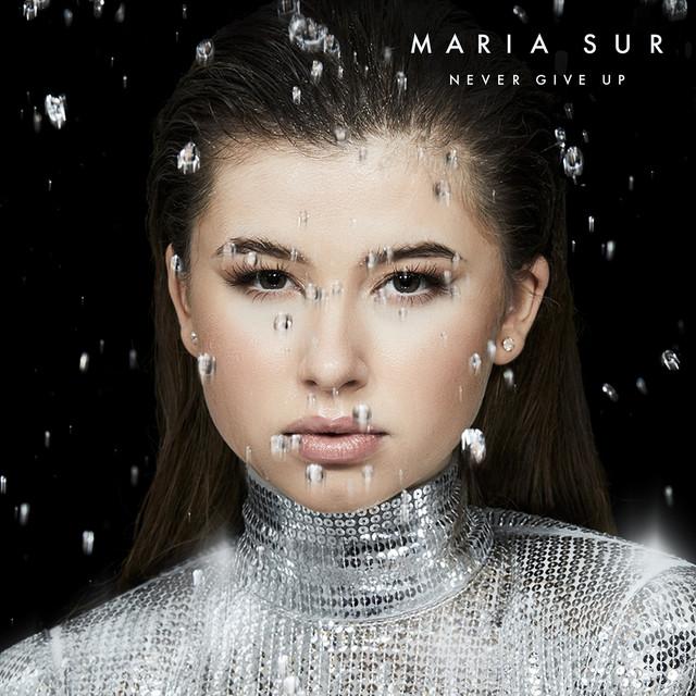 Never Give Up – Maria Sur